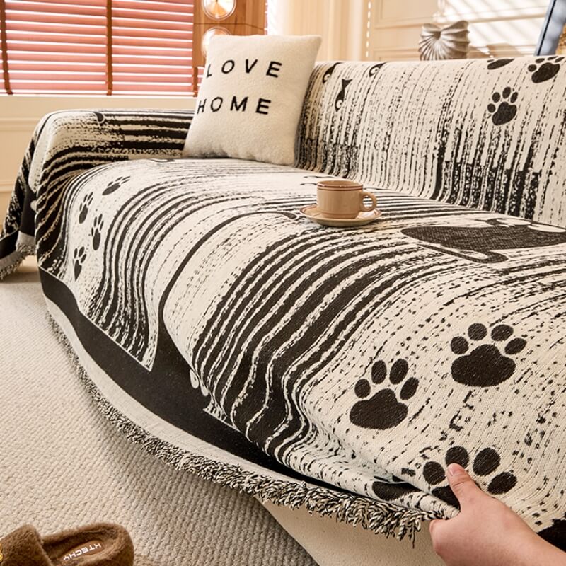 Funda de Sofá Antideslizante con Diseño de Patas – Protección y Confort 